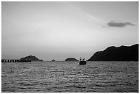 Boats and Con Son Bay at sunset. Con Dao Islands, Vietnam ( black and white)