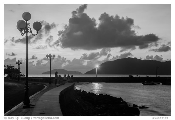Lamps and Con Son seafront before sunrise. Con Dao Islands, Vietnam (black and white)