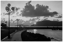 Lamps and Con Son seafront before sunrise. Con Dao Islands, Vietnam ( black and white)