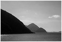 Hills plunging in sea, Bay Canh Island, Con Dao National Park. Con Dao Islands, Vietnam ( black and white)
