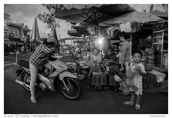 Con Dao market scene at dusk, Con Son. Con Dao Islands, Vietnam (black and white)