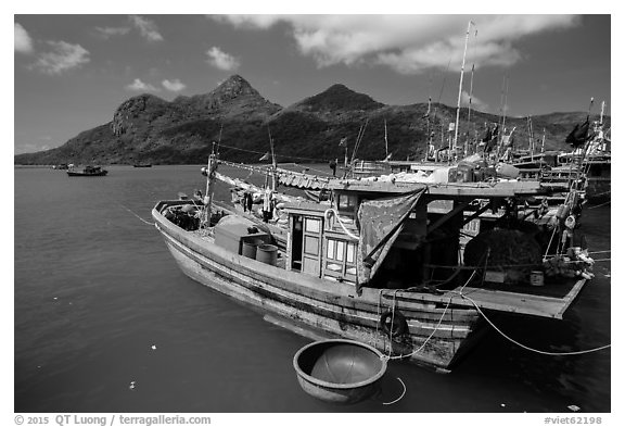 Wooden fishing boats in Ben Dam harbor. Con Dao Islands, Vietnam (black and white)