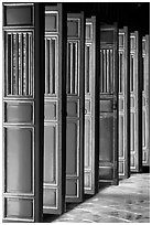 Red doors of the temple inside the Minh Mang Mausoleum. Hue, Vietnam ( black and white)