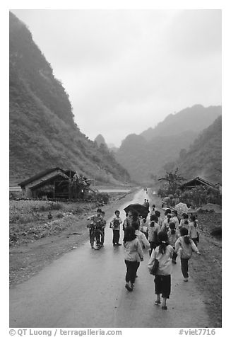 Children returning from school, Ma Phuoc Pass area. Northeast Vietnam (black and white)
