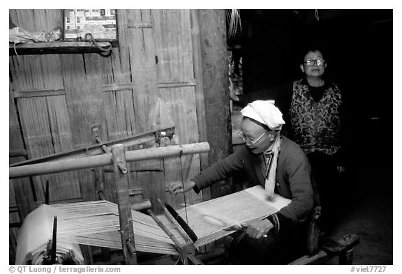 Elderly woman weaving in her home. Northeast Vietnam (black and white)