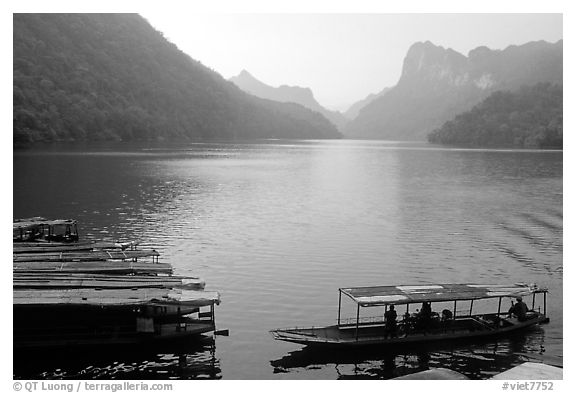 Boats on the shores of Ba Be Lake. Northeast Vietnam (black and white)