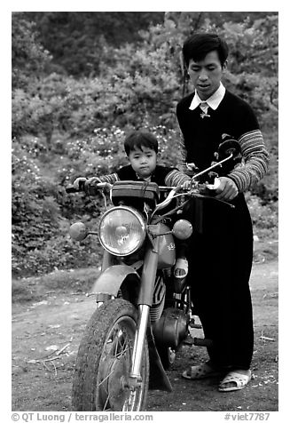 Hmong motorcyclist and boy, Xa Linh. Northwest Vietnam (black and white)