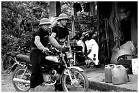 Two Hmong motorcyclists at the Xa Linh market. Northwest Vietnam (black and white)