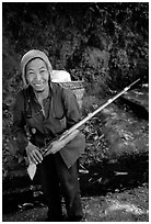 Hunter holding an old rifle, near Lai Chau. Northwest Vietnam (black and white)