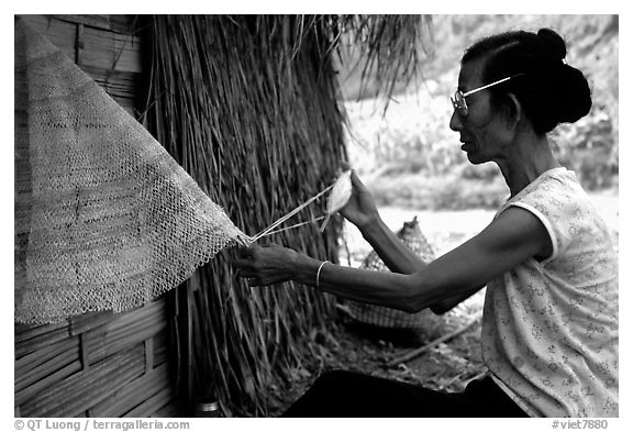 Woman sewing a net, between Lai Chau and Tam Duong. Northwest Vietnam (black and white)