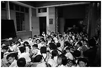 School children in an outdoor class. Ho Chi Minh City, Vietnam (black and white)