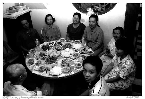 Family meal. Ho Chi Minh City, Vietnam (black and white)