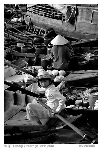 Child at Phung Hiep floating market. Can Tho, Vietnam (black and white)