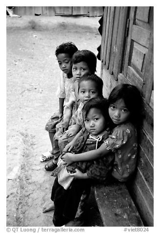 black and white photos of children. Children of minority village.
