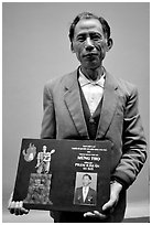 Former militia member with certificate of heroism, Hanoi. Vietnam (black and white)