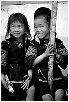 Black Hmong girls, with their daily fix of sugar cane, Sapa. Vietnam ( black and white)