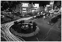 Intersection of Le Loi and Nguyen Hue boulevards at night. Ho Chi Minh City, Vietnam ( black and white)