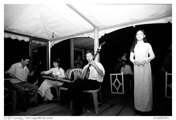 Traditional floating concert on the Perfume river. The city has remained Vietnam's artistic center. Hue, Vietnam (black and white)