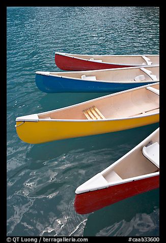Close up of red, yellow and blue canoes, Moraine Lake. Banff National Park, Canadian Rockies, Alberta, Canada