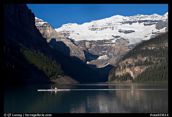 Rower, Lake Louise, and Victoria Peak, early morning. Banff National Park, Canadian Rockies, Alberta, Canada (color)
