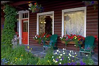 Porch of a cabin with flowers. Banff National Park, Canadian Rockies, Alberta, Canada (color)