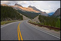 Twisting road, Icefields Parkway, sunset. Banff National Park, Canadian Rockies, Alberta, Canada (color)