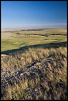 Prairie and teepees from the top of the cliff, Head-Smashed-In Buffalo Jump. Alberta, Canada (color)