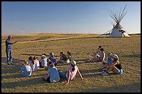First nations man giving a lecture to students, Head-Smashed-In Buffalo Jump. Alberta, Canada