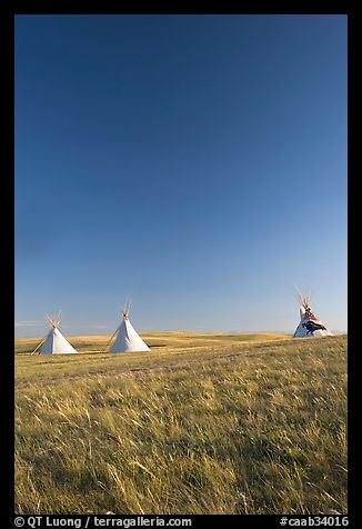 Teepee tents and prairie, late afternoon, Head-Smashed-In Buffalo Jump. Alberta, Canada (color)