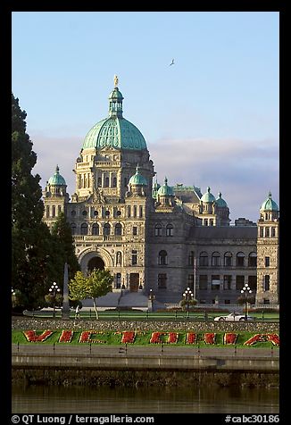 Legistlative buildings and Victoria written in flowers, morning. Victoria, British Columbia, Canada