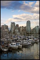 Skyline and boats seen from Fishermans harbor, late afternoon. Vancouver, British Columbia, Canada (color)