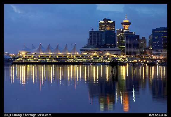 Canada Palace at night and Harbor Center at night. Vancouver, British Columbia, Canada (color)