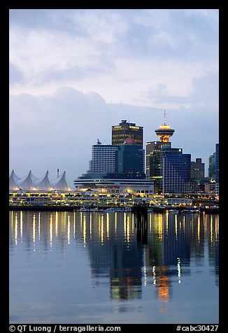 Canada Palace at night and Harbor Center at dawn. Vancouver, British Columbia, Canada (color)