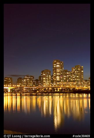 Skyline seen across False Creek at night. Vancouver, British Columbia, Canada