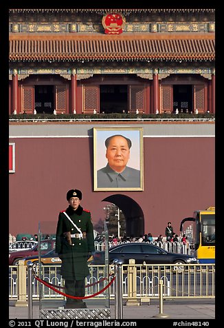 Guard in winter uniform and Mao Zedong picture, Tiananmen Square. Beijing, China (color)