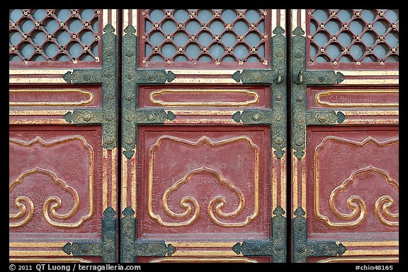 Door detail, imperial architecture, Forbidden City. Beijing, China (color)