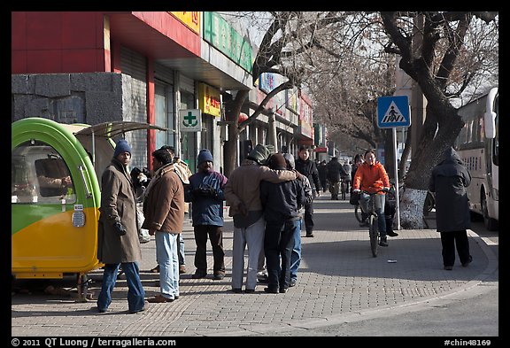 People on sidewalk. Beijing, China (color)