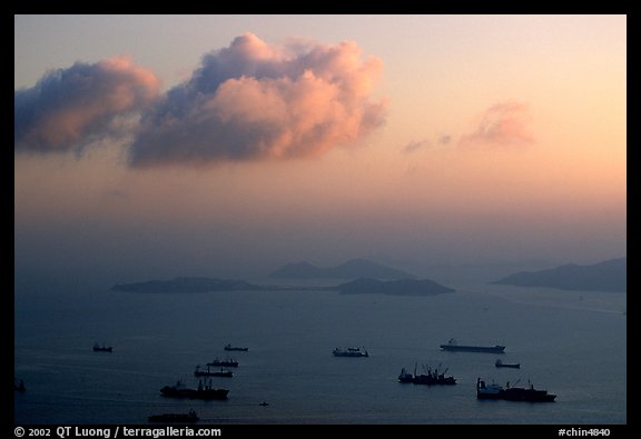 Cargo ships anchored outside of the harbor. Hong-Kong, China (color)