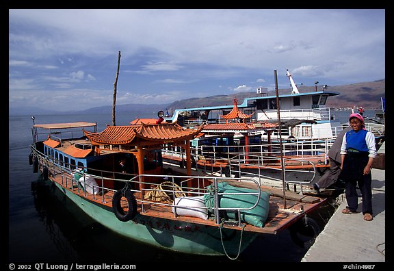 Boats on a pier of Erhai Lake. Dali, Yunnan, China