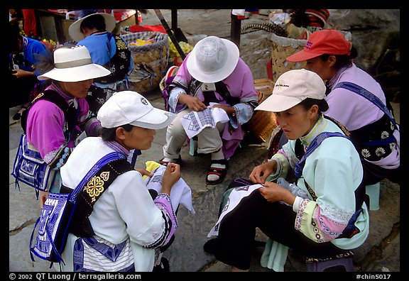 Sani women making embroidery. Shilin, Yunnan, China