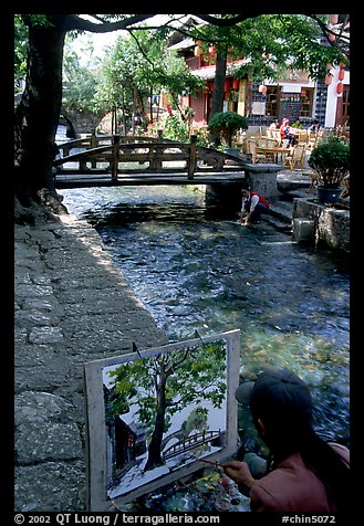 Painting a bridge. Lijiang, Yunnan, China