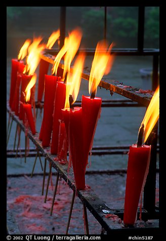 Candles burning. Emei Shan, Sichuan, China