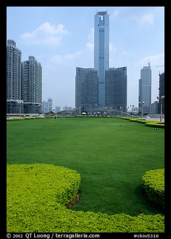 Landscaped plaza and highrises near the East train station. Guangzhou, Guangdong, China (color)