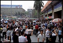 Crowds waiting outside the main train station. Guangzhou, Guangdong, China
