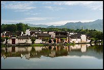 Village reflected in South Lake. Hongcun Village, Anhui, China