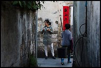 Two women in alley. Xidi Village, Anhui, China ( color)
