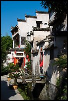 Village street with stream. Xidi Village, Anhui, China