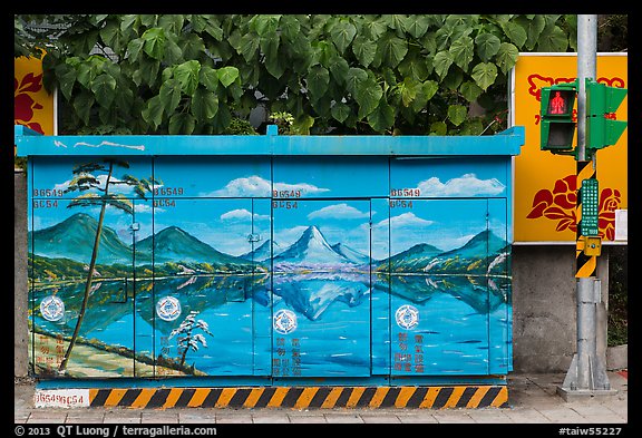 Electric utility boxe with nature landscape painting. Taipei, Taiwan (color)