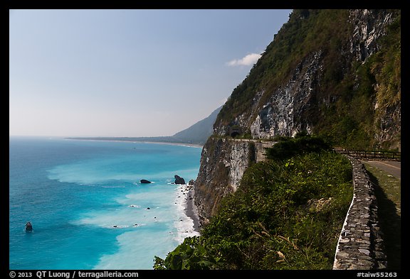 Road atop steep see cliffs overlooking ocean. Taroko National Park, Taiwan