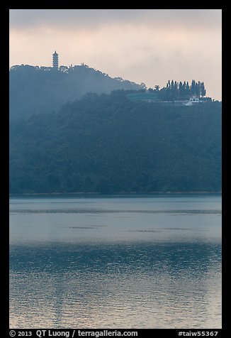Syuanzang Temple and Tsen Pagoda in dawn mist. Sun Moon Lake, Taiwan (color)